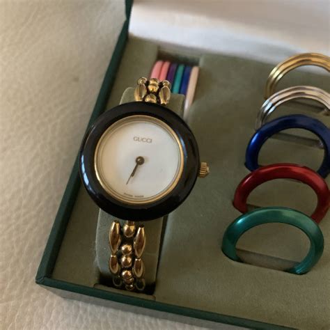 gucci watch with changeable face.